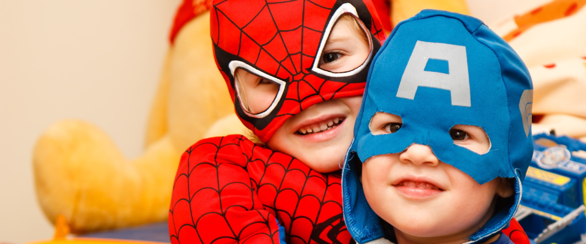 kids wearing halloween costumes